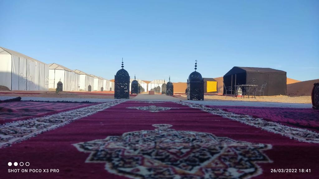 Night sky filled with stars over Sahara desert camp in Merzouga